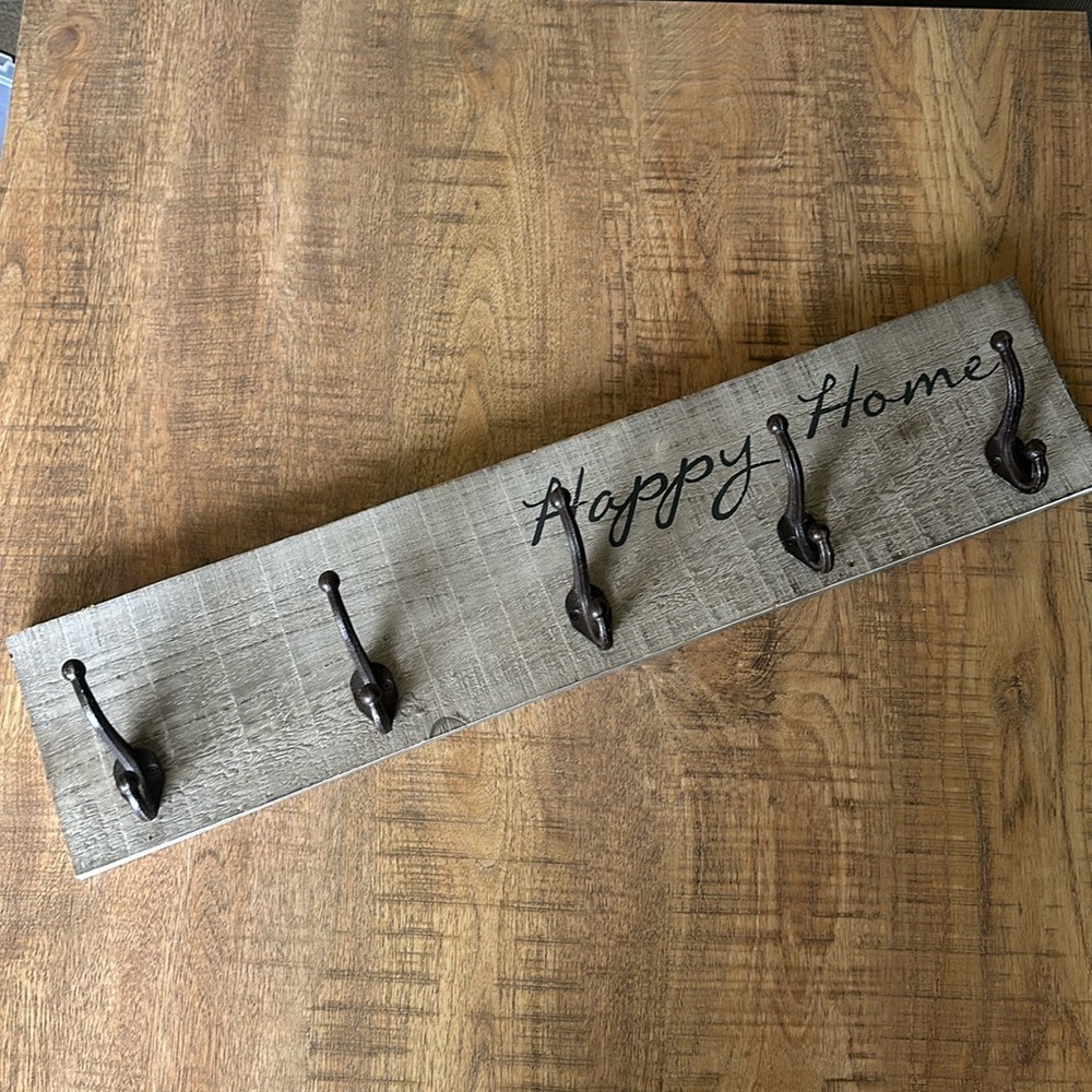 Kirkland’s Happy Home wall decor with hooks